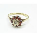 A 9ct gold, red stone and diamond cluster ring, 1.