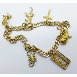 A yellow metal bracelet with a 14ct gold abacus charm,