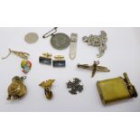 A trench art lighter, one other lighter, badges, etc.