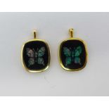 Two 14ct gold and opal butterfly pendants