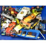 A box of die-cast vehicles including Matchbox, Tonka and Corgi,