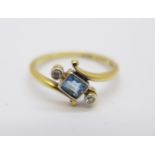 An 18ct gold, topaz and diamond ring, 2g,