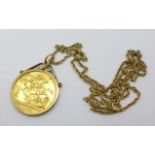 A Victorian 1898 full sovereign in a 9ct gold pendant mount and on a 9ct gold chain,