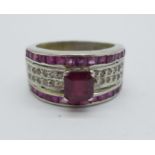 A large ruby and diamond set ring, V,
