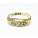 An 18ct gold, five stone diamond ring, 3.