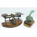A set of postal scales and a desk seal