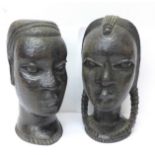 Two African tribal art carved heads,