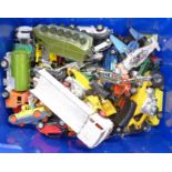 A box of die-cast vehicles including Dinky and Matchbox,