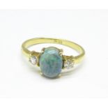 An 18ct gold, black opal and diamond ring, 2.