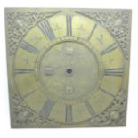 A brass longcase clock dial