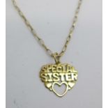 A 9ct gold 'Sister' pendant and chain, 1.