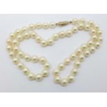 A cultured pearl necklace with 9ct gold clasp