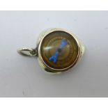 A Victorian silver compass fob in the shape of a heart,