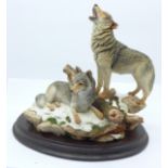 A Country Artists figure of two wolves