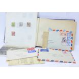 A French stamp album with world stamps,