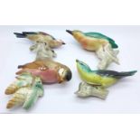 Four bird wall plaques,