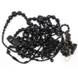 Jet and black bead necklaces and a bracelet