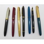 Assorted pens including a Sheaffer and a Parker with 14ct gold nibs,
