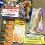 A collection of modeller's tools, Airfix paints, etc.