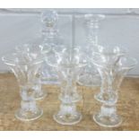 Two decanters and six pressed glasses