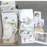 A box of early 20th Century greeting cards and postcards