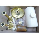 A pair of brass candlesticks, a brass chamber stick, a brass and glass inkwell, horn beaker,