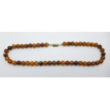 An amber coloured necklace