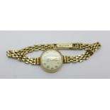 A lady's 9ct gold Timor wristwatch with 9ct gold bracelet, case back bears inscription,