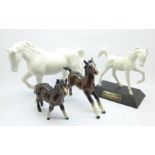 Three Beswick horse figures including Springtime and a Royal Doulton horse figure,