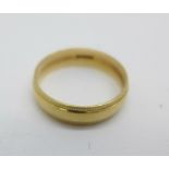 A 9ct gold wedding ring, 1.