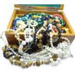 A wooden box with vintage bead necklaces, 1.
