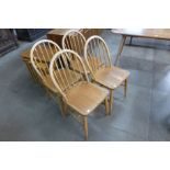 A set of four Ercol Blonde chairs