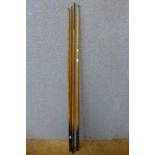 Two Joe Davies snooker cues, two other cues, curtain pole, etc.