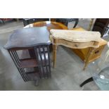 A Victorian inlaid mahogany revolving bookcase and a pine console table