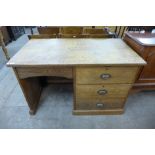 An oak kneehole desk