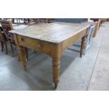 A Victorian pine single drawer farmhouse kitchen table