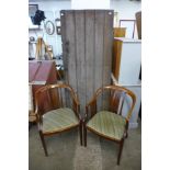 A pair of Edward VII mahogany tub chairs and 17th Century door