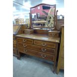 An Edward VII inlaid mahogany dressing table and chest of drawers