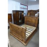 A 19th Century French fruitwood double bed