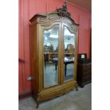 A 19th Century French walnut armoire (signs of old woodworm to one foot)