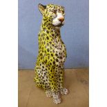 An Italian painted terracotta life size figure of a cheetah