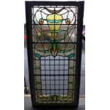 A large Art Nouveau stained glass window