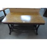 A Victorian walnut rectangular stretcher table