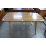 An Ercol Blonde dining table