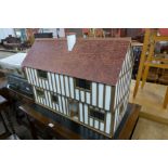 A Tudor style dolls house