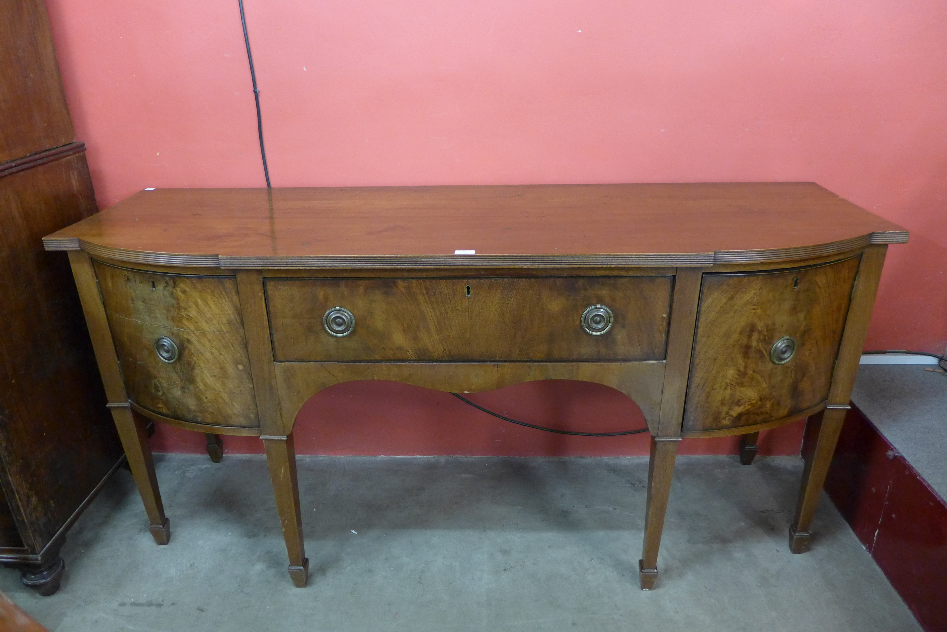 A George III mahogany breakfront sideboard