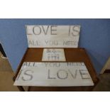 A stencilled Beatles wooden sign