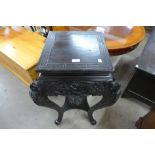 A Chinese ebonised jardiniere stand