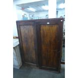 A part pine two door cupboard