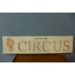 A wooden circus sign